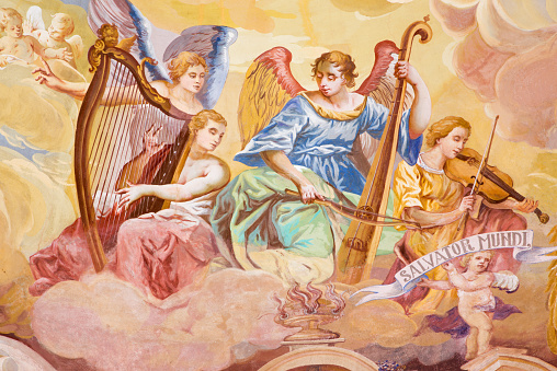 banska-stiavnica-fresco-of-angels-with-the-music-instrumens-illustration-id467890618